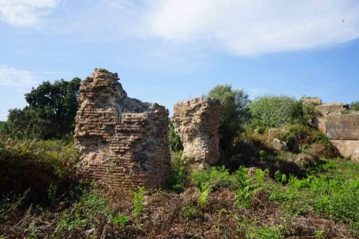 A surviving pillar of the Roman aqueduct at the ancient ruins of Nikopolis, near Preveza, Greece.