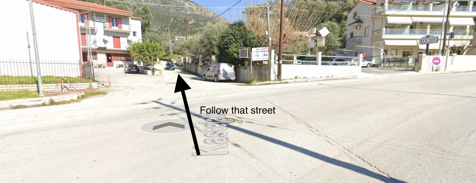 The junction on the main road into Parga, with an arrow pointing up the side street signposted Kastelakia