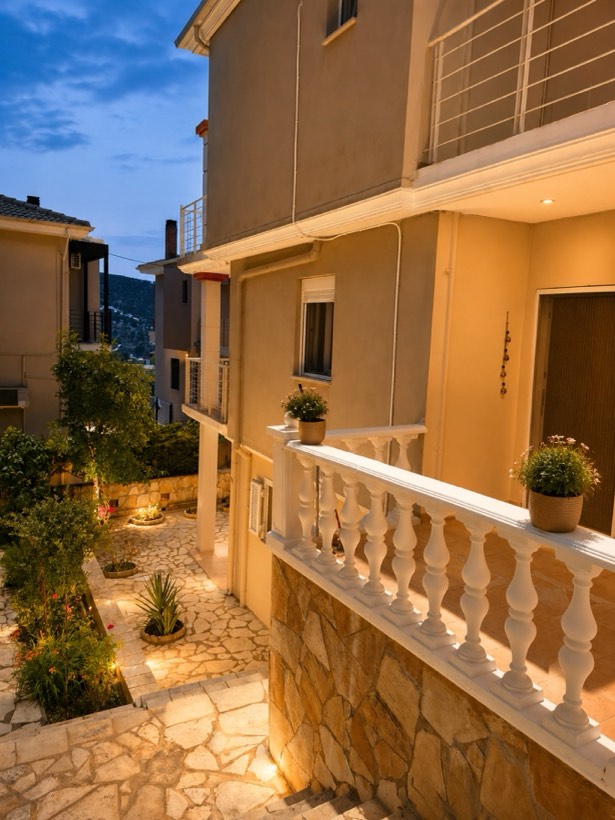 Garden and balustrade lit up at dusk